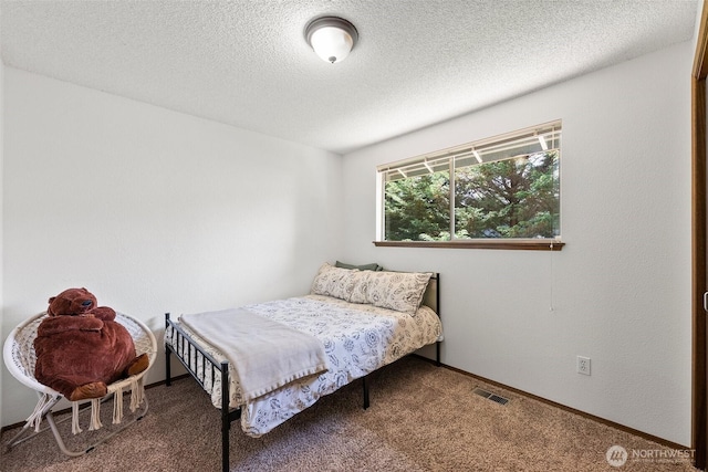 13222 76th Avenue Ct E, Puyallup, WA 98373 - carpeted bedroom with a textured ceiling