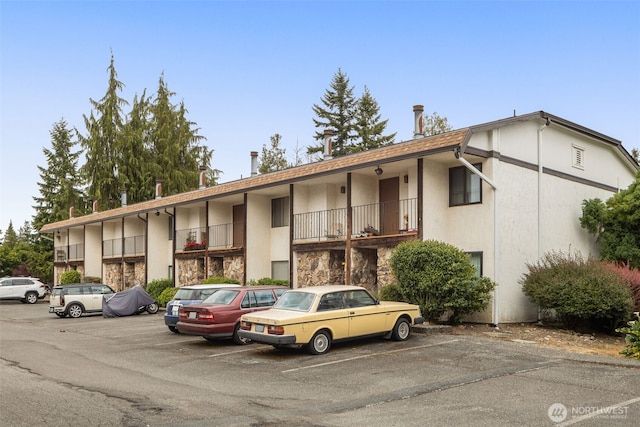 7812 196th St SW Unit B2, Edmonds, WA 98026 - view of building exterior featuring uncovered parking