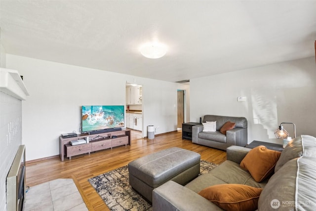 1921 Mountain View Dr, Mount Vernon, WA 98273 - living area featuring light wood-type flooring and baseboards