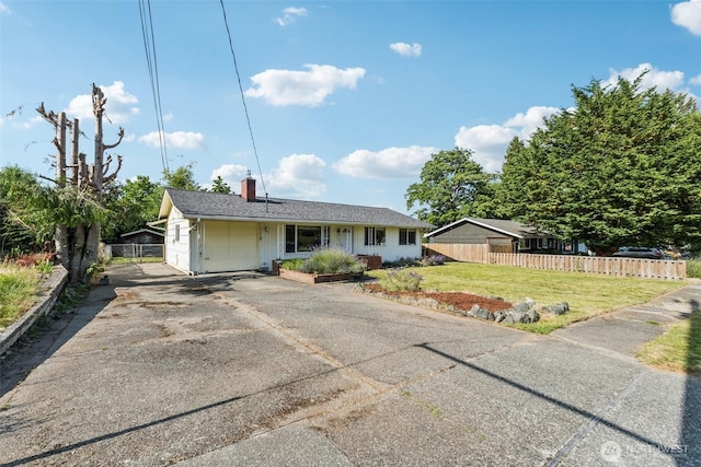 1921 Mountain View Dr, Mount Vernon, WA 98273 - view of front facade with concrete driveway and a chimney