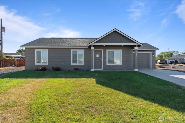 1325 Shaw St, Moses Lake, WA 98837 - single story home featuring a garage, a front yard, concrete driveway, and a shingled roof