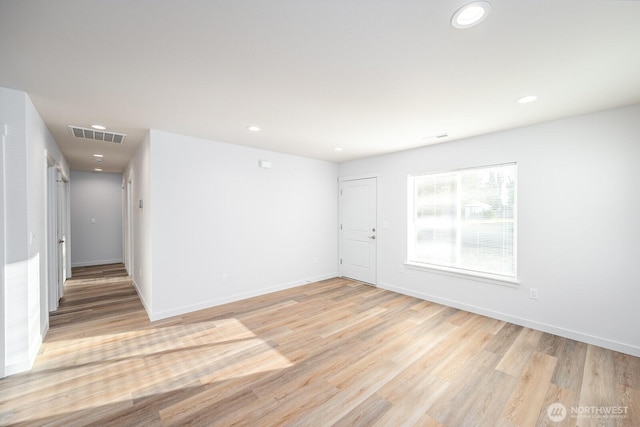 1325 Shaw St, Moses Lake, WA 98837 - spare room with recessed lighting and light wood-style floors