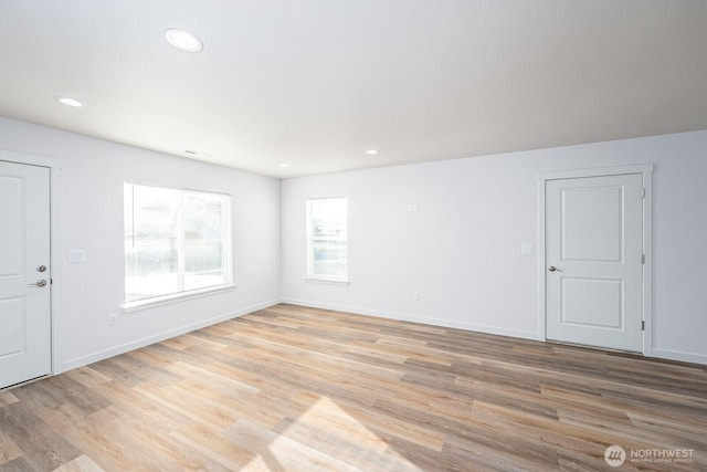 1325 Shaw St, Moses Lake, WA 98837 - empty room featuring light wood-style flooring and recessed lighting