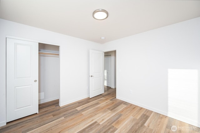 1325 Shaw St, Moses Lake, WA 98837 - unfurnished bedroom featuring light wood finished floors and a closet