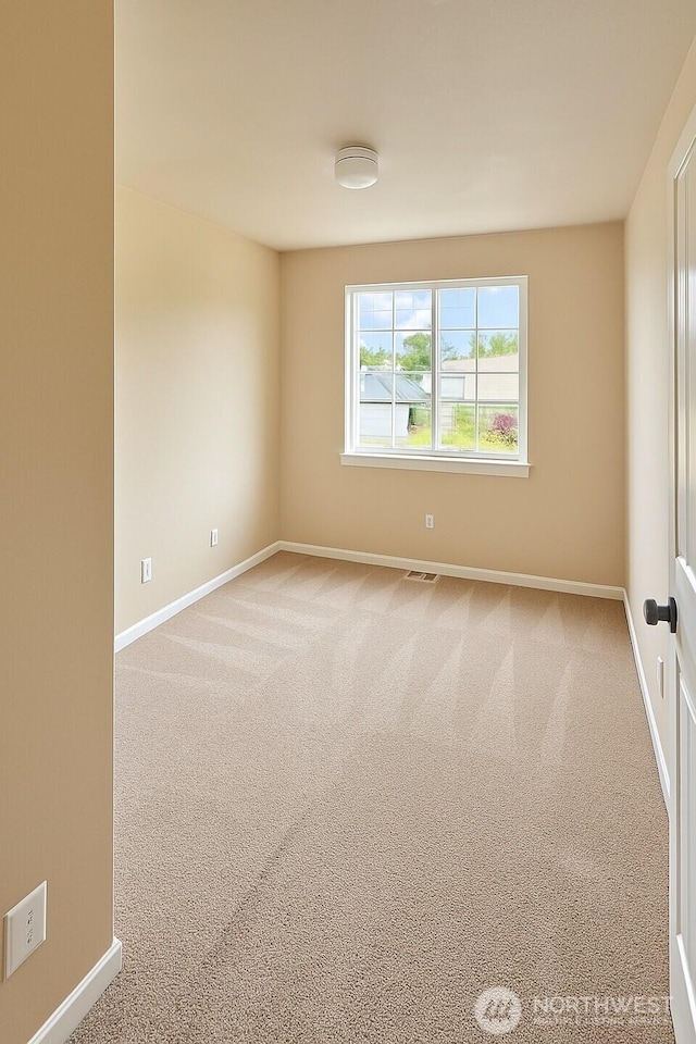 20211 85th Avenue Ct E, Spanaway, WA 98387 - spare room with light colored carpet and baseboards