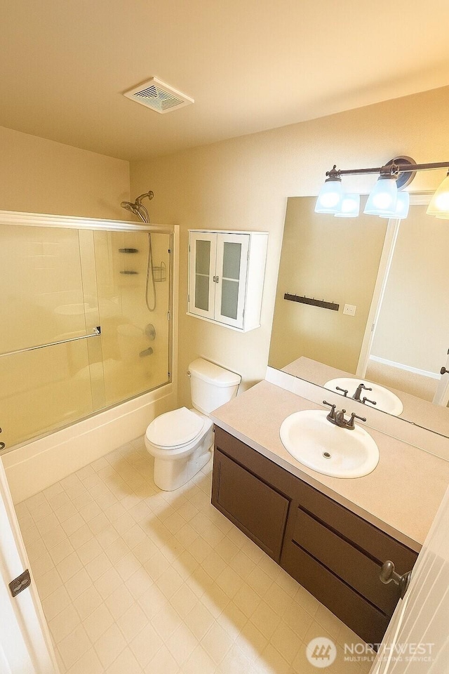 20211 85th Avenue Ct E, Spanaway, WA 98387 - full bathroom featuring vanity, combined bath / shower with glass door, and tile patterned floors