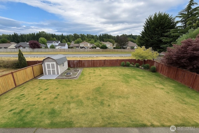 20211 85th Avenue Ct E, Spanaway, WA 98387 - fenced backyard with a storage shed and a residential view