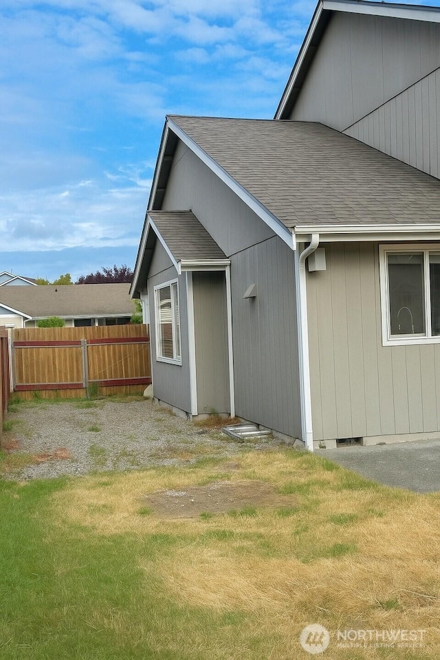 20211 85th Avenue Ct E, Spanaway, WA 98387 - view of home's exterior featuring roof with shingles