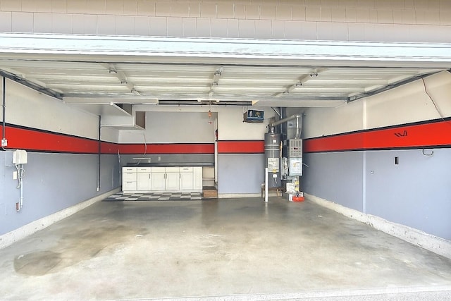 20211 85th Avenue Ct E, Spanaway, WA 98387 - garage with water heater and baseboards