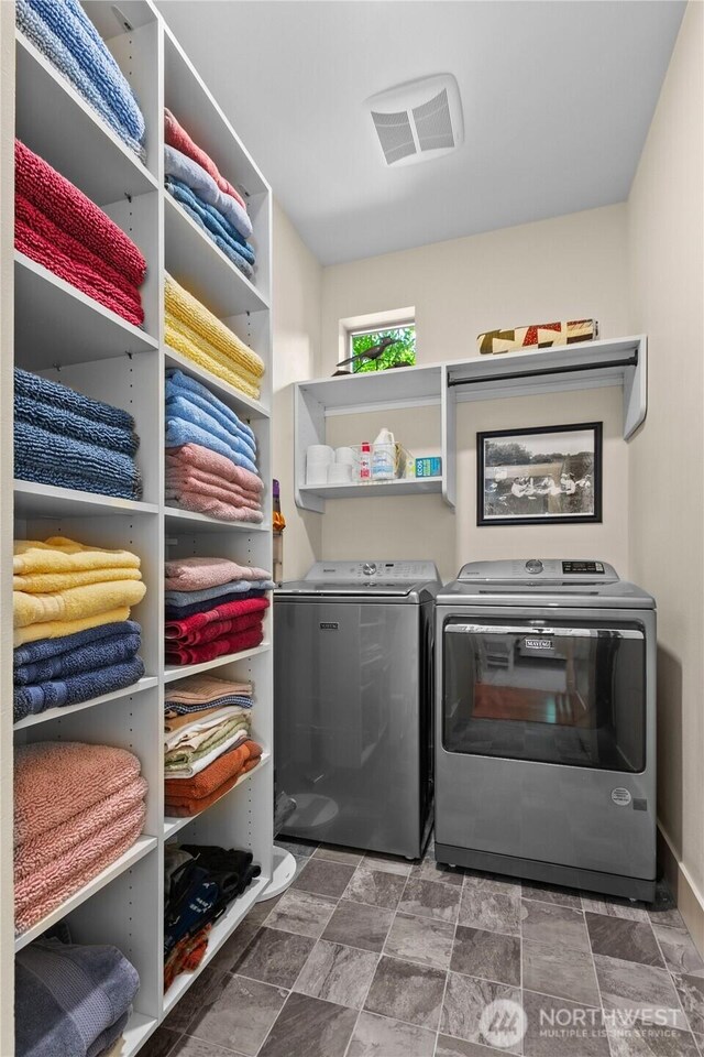 1129 Birch Falls Dr, Bellingham, WA 98229 - laundry room with independent washer and dryer and stone finish flooring