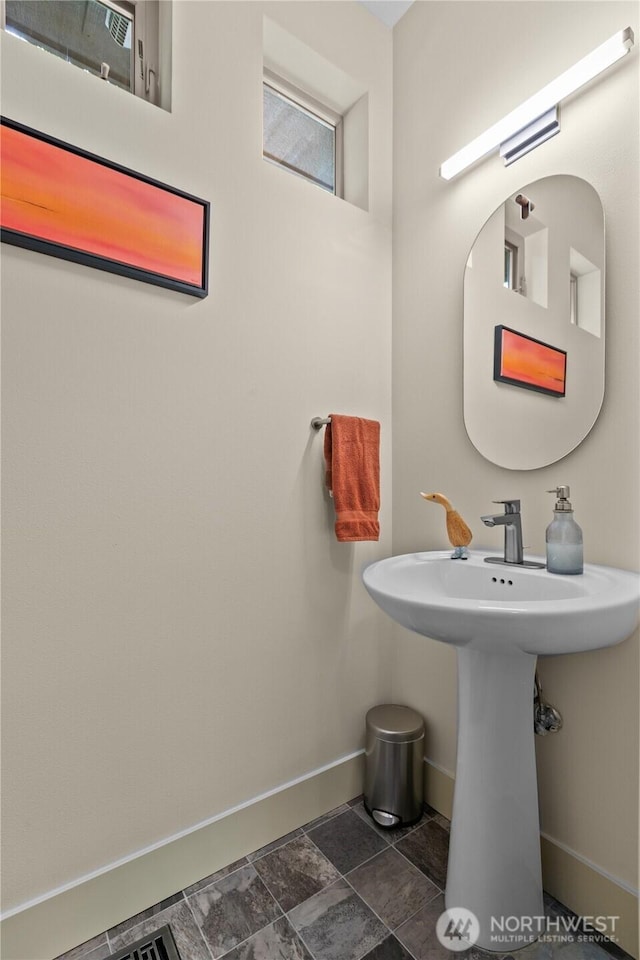 1129 Birch Falls Dr, Bellingham, WA 98229 - bathroom with baseboards and stone finish floors