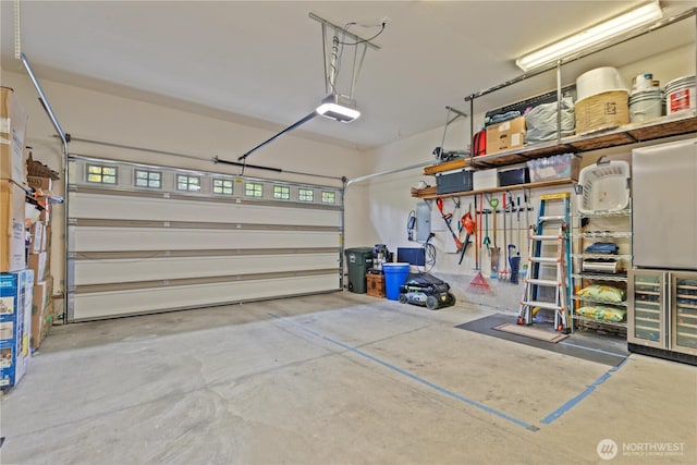 1129 Birch Falls Dr, Bellingham, WA 98229 - garage with a garage door opener, refrigerator, and beverage cooler