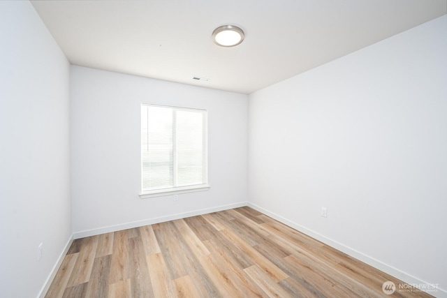 1420 W Craig St, Moses Lake, WA 98837 - unfurnished room featuring light wood-type flooring and baseboards