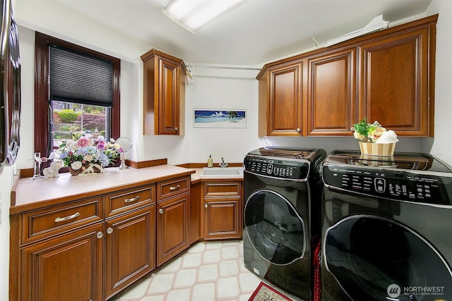 21031 49th Ave SE, Bothell, WA 98021 - laundry room featuring washing machine and dryer, cabinet space, and light flooring