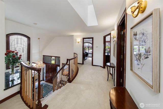 21031 49th Ave SE, Bothell, WA 98021 - entrance foyer featuring light carpet, a chandelier, and a skylight