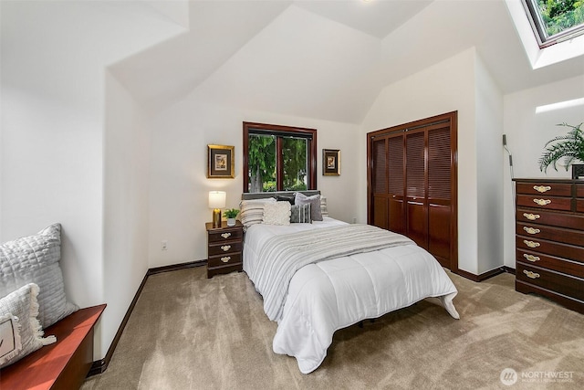 21031 49th Ave SE, Bothell, WA 98021 - bedroom with a skylight, light carpet, multiple windows, and lofted ceiling
