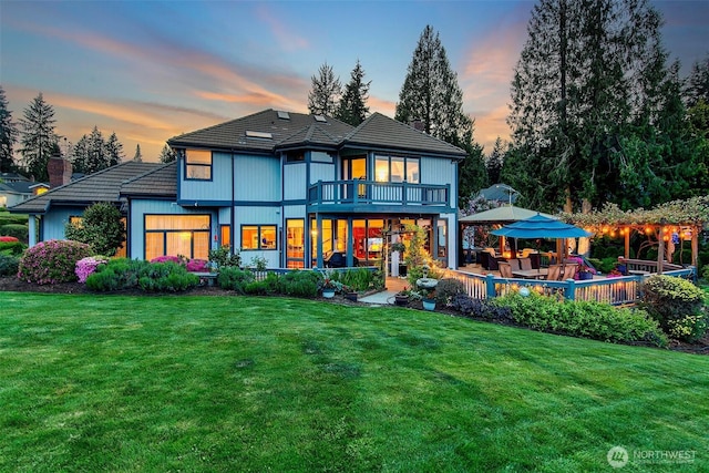 21031 49th Ave SE, Bothell, WA 98021 - back of house with a chimney, a lawn, a balcony, and a gazebo
