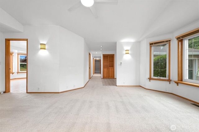 5788 Hannegan Rd, Bellingham, WA 98226 - spare room featuring light carpet, ceiling fan, and lofted ceiling
