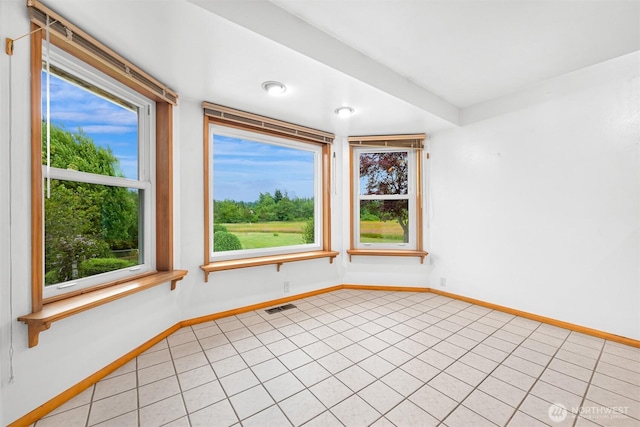5788 Hannegan Rd, Bellingham, WA 98226 - spare room with light tile patterned floors and healthy amount of natural light