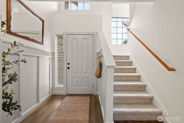 10307 140th Street Ct E Unit 3, Puyallup, WA 98374 - entryway featuring wood finished floors, a high ceiling, and stairway