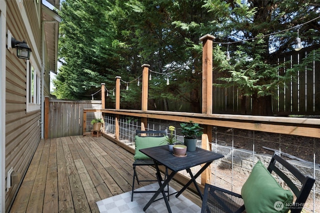 10307 140th Street Ct E Unit 3, Puyallup, WA 98374 - wooden deck with a fenced backyard