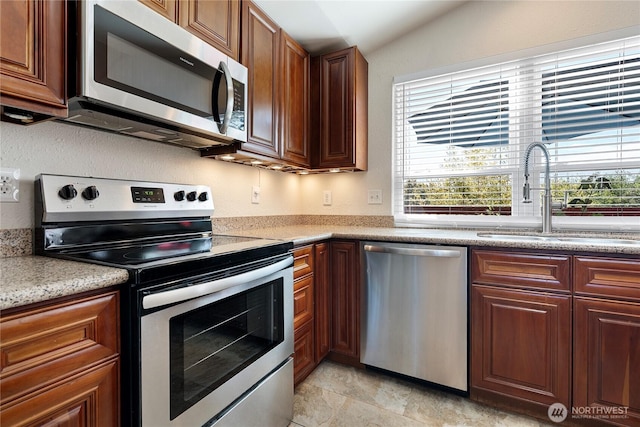 32867 42nd Pl SW, Federal Way, WA 98023 - kitchen featuring appliances with stainless steel finishes, plenty of natural light, light countertops, and vaulted ceiling