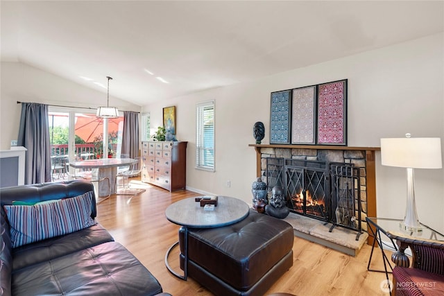 32867 42nd Pl SW, Federal Way, WA 98023 - living room with wood finished floors, vaulted ceiling, and a fireplace