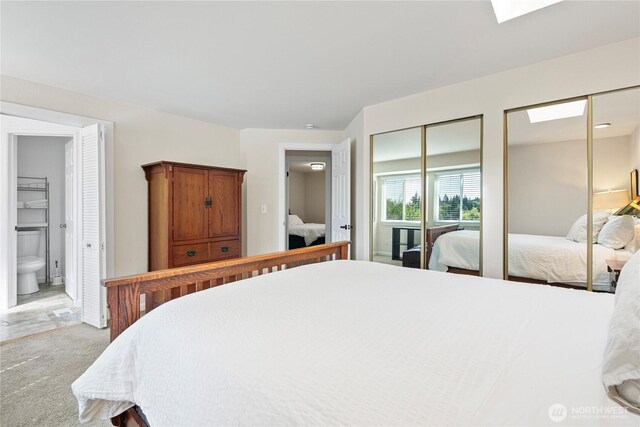 32867 42nd Pl SW, Federal Way, WA 98023 - bedroom with two closets, light carpet, and ensuite bathroom