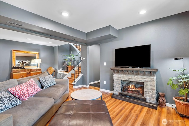 32867 42nd Pl SW, Federal Way, WA 98023 - living area featuring stairway, wood finished floors, and a fireplace