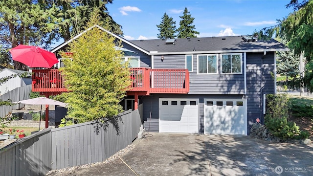 32867 42nd Pl SW, Federal Way, WA 98023 - view of front of property featuring an attached garage, concrete driveway, and a wooden deck