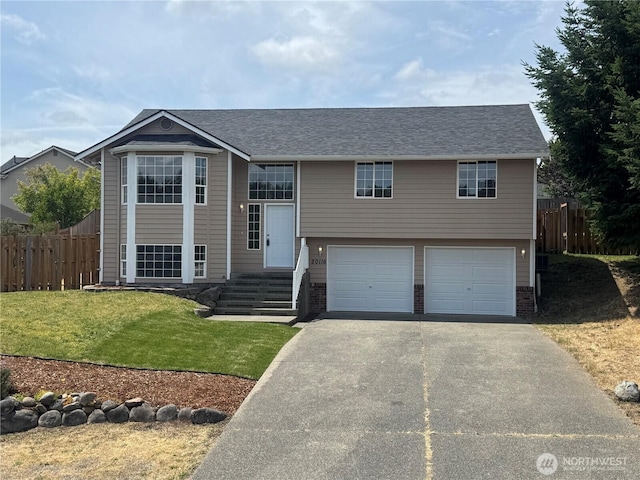 20116 85th Avenue Ct E, Spanaway, WA 98387 - bi-level home with a garage and driveway