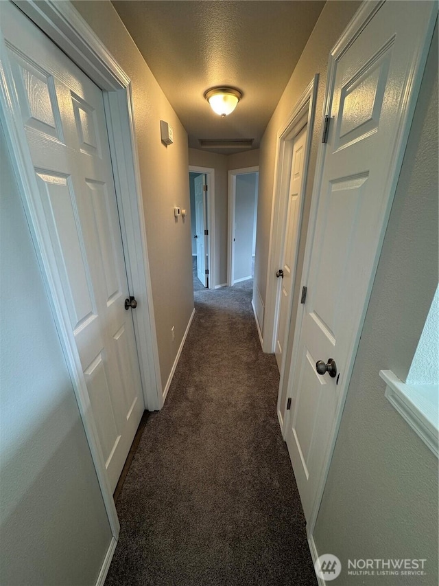 20116 85th Avenue Ct E, Spanaway, WA 98387 - hall with dark colored carpet and a textured ceiling