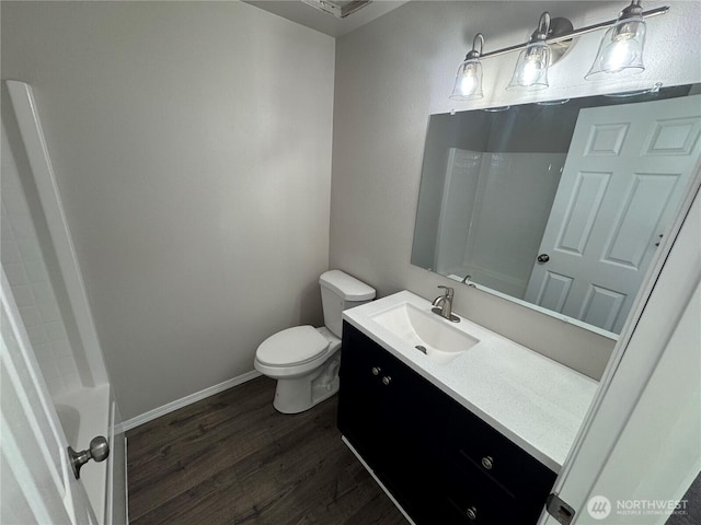 20116 85th Avenue Ct E, Spanaway, WA 98387 - bathroom with wood finished floors, vanity, a bath, and a shower