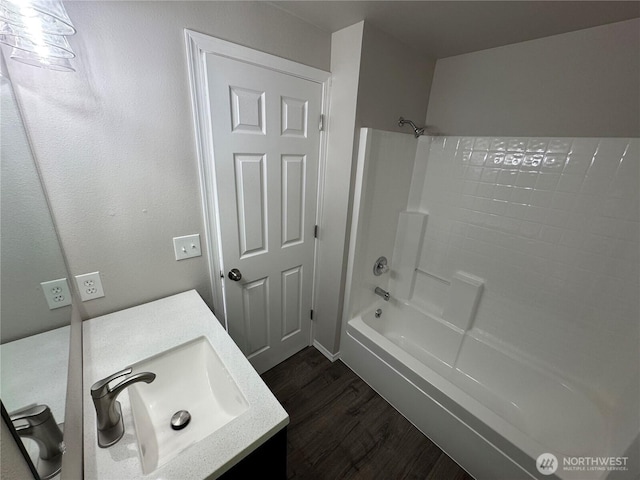 20116 85th Avenue Ct E, Spanaway, WA 98387 - full bathroom with wood finished floors, vanity, and shower / washtub combination
