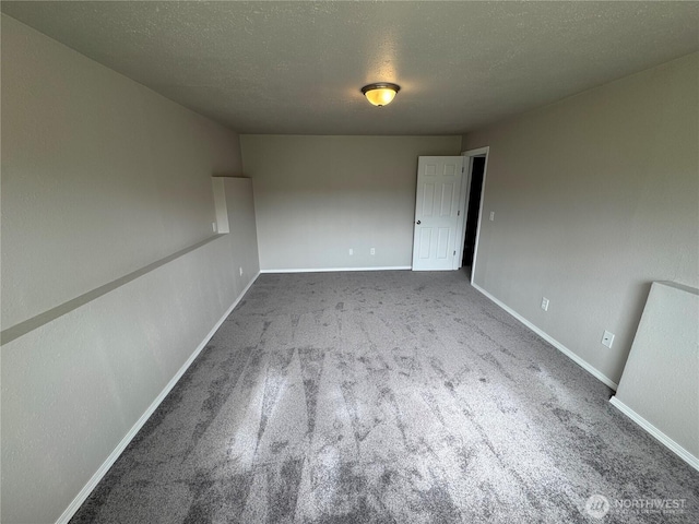 20116 85th Avenue Ct E, Spanaway, WA 98387 - empty room with carpet flooring and a textured ceiling