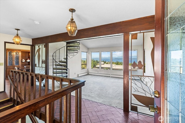1125 Vista Pl, Edmonds, WA 98020 - entrance foyer featuring dark colored carpet, stairway, and a baseboard heating unit
