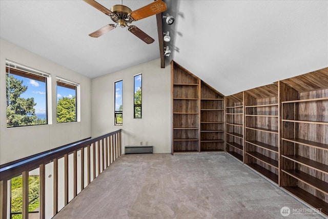 1125 Vista Pl, Edmonds, WA 98020 - hall with lofted ceiling, baseboard heating, carpet floors, and built in shelves