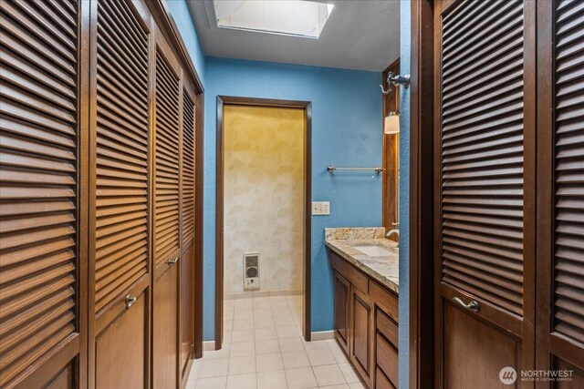 1125 Vista Pl, Edmonds, WA 98020 - bathroom featuring a closet, tile patterned floors, and vanity