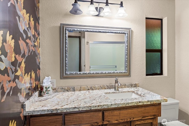 1125 Vista Pl, Edmonds, WA 98020 - bathroom featuring a textured wall and vanity