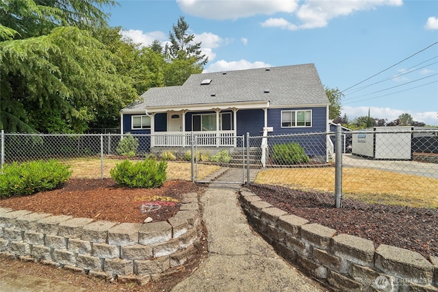 6817 S D St, Tacoma, WA 98408 - view of front of home with a porch, a fenced front yard, a gate, and roof with shingles