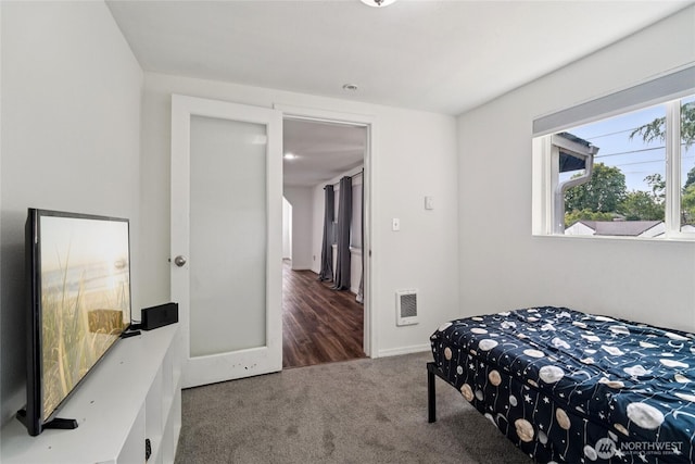 6817 S D St, Tacoma, WA 98408 - carpeted bedroom featuring heating unit and baseboards