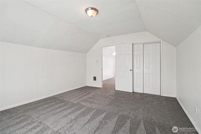 6817 S D St, Tacoma, WA 98408 - additional living space with lofted ceiling and dark colored carpet