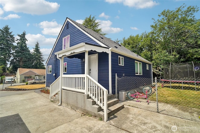 6817 S D St, Tacoma, WA 98408 - view of front facade featuring a trampoline