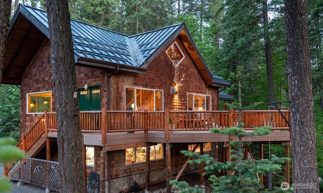 7905 Mountain Home Rd, Leavenworth, WA 98826 - rear view of property featuring a standing seam roof, a metal roof, and a wooden deck