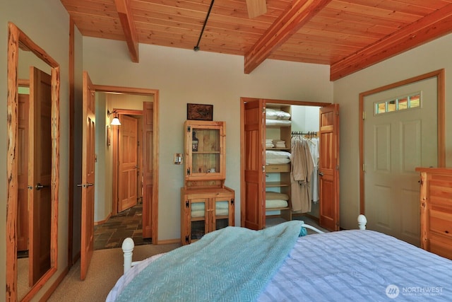 7905 Mountain Home Rd, Leavenworth, WA 98826 - bedroom featuring carpet, a wooden ceiling with exposed beams, and a closet
