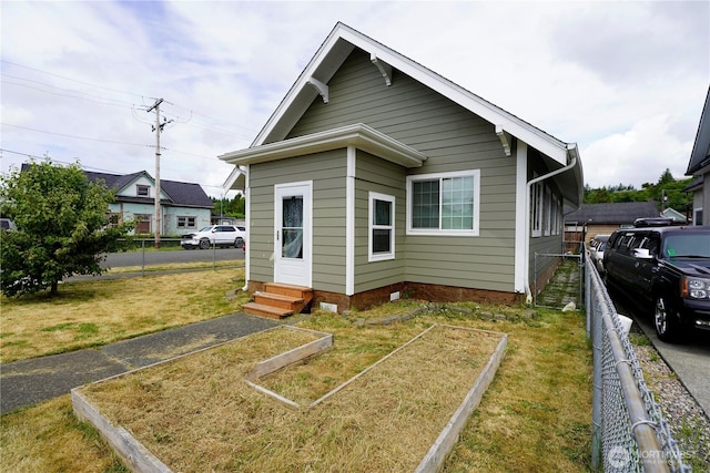 401 Emerson Ave, Hoquiam, WA 98550 - view of front of property with entry steps and a vegetable garden