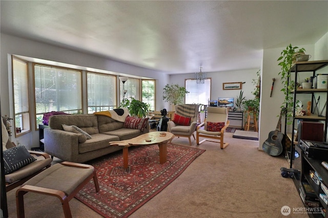 11219 4th Pl S, Seattle, WA 98168 - carpeted living room featuring a chandelier