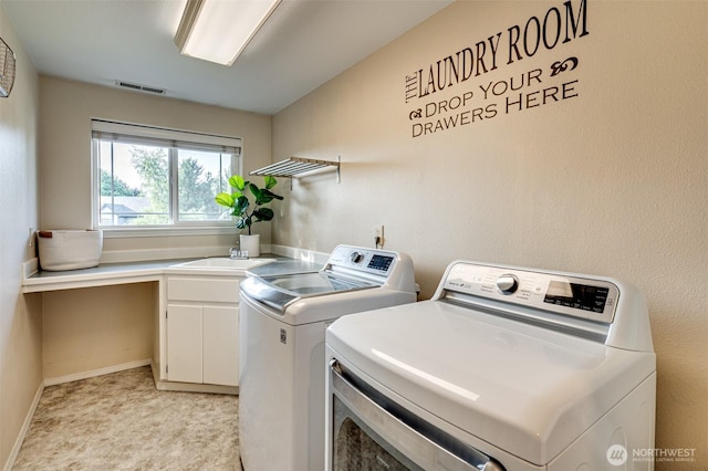 1732 NW 29th Cir, Camas, WA 98607 - laundry area with washer and clothes dryer and cabinet space