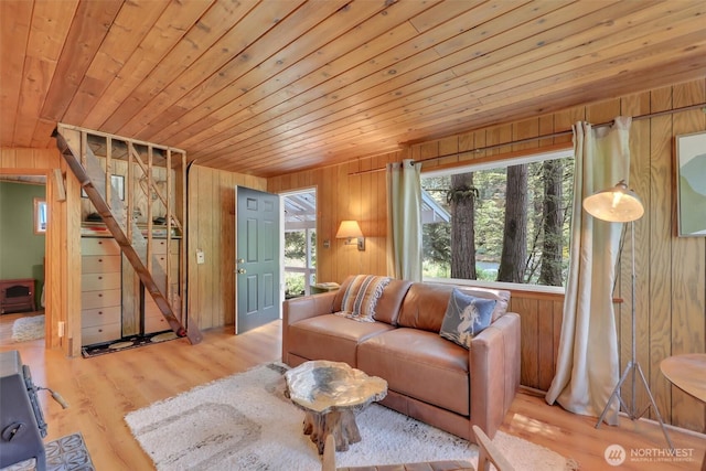 12319 744th Ave NE, Skykomish, WA 98288 - living room featuring wood ceiling, wood walls, healthy amount of natural light, and wood finished floors