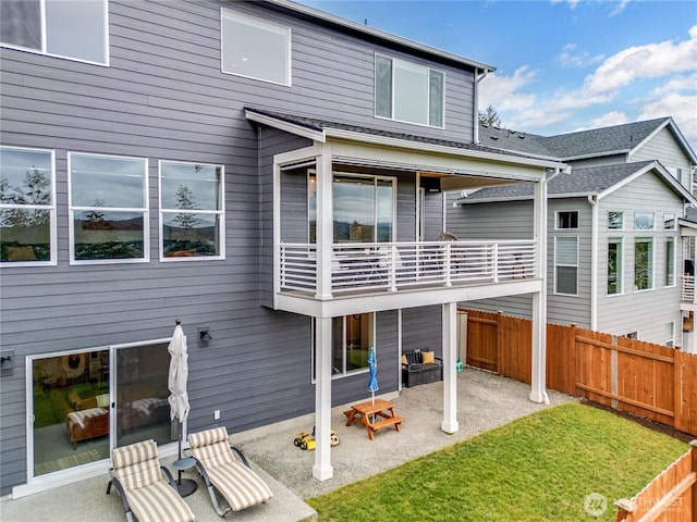 1995 NW Rustling Fir Ln, Silverdale, WA 98383 - rear view of property with a balcony and a patio area